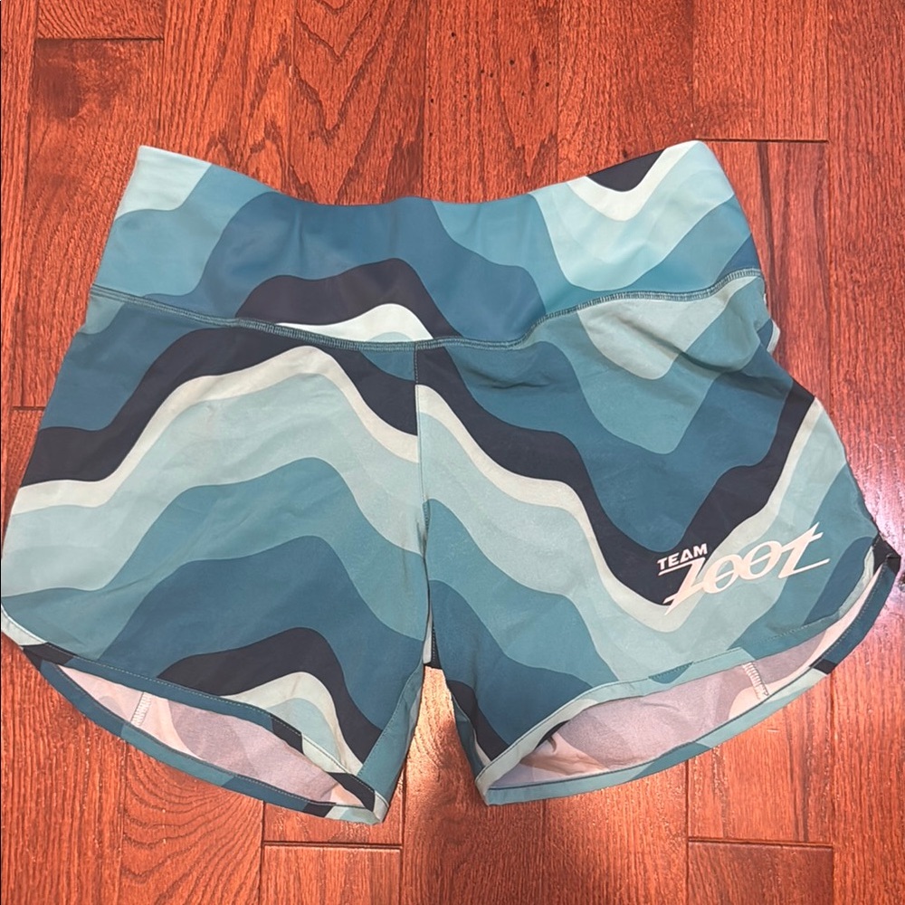 Zoot Women's Athletic Shorts - Teal Wave Design